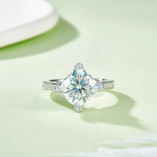 Diamond ring on a light green background